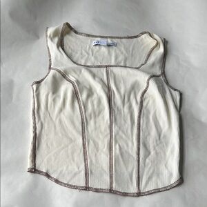 Cream Sleeveless Top with Brown Trim from And Now This
